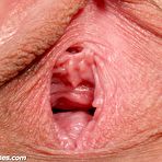 Fourth pic of Kira wearing nurse uniform pussy gaping and fingering