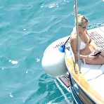 Third pic of Sharon Stone ass crack in white bikini