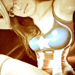 Second pic of Cute asian girl with glasses shows her perky boobs 