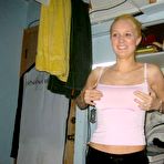 Second pic of Big titted slutty blonde posing in see through bunny out fit