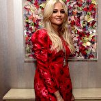 Third pic of Pixie Lott in stockings and red dress photoshoot