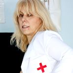 Second pic of Aged nurse Milena gaping her experienced minge wide