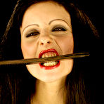 Third pic of Dolly Dreadful in fetish strip