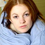 First pic of ATK galleria presents: Nicole, fair skinned redhead stripping in her bed.