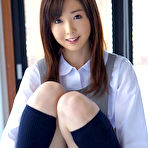 Second pic of Mio Ayame Asian smiles and shows ass in panty under uniform