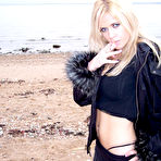 Second pic of Ann Angel - Ann Angel takes her sexy black jacket off outdoors and shows us her breasteas