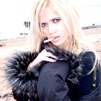 Third pic of Ann Angel - Ann Angel takes her sexy black jacket off outdoors and shows us her breasteas