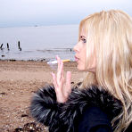 Fourth pic of Ann Angel - Ann Angel takes her sexy black jacket off outdoors and shows us her breasteas