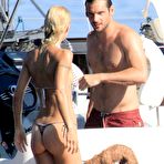 First pic of Michelle Hunziker shows her round ass on the yacht