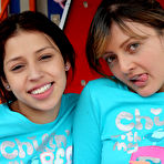 Second pic of Two latina girls in tight pink leggings have fun in the park