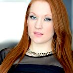 Third pic of Redhead Lucy Ohara In Black Fishnets