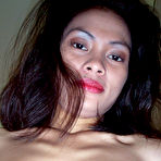 Fourth pic of Horny young Filipina chick spreading legs in white stockings