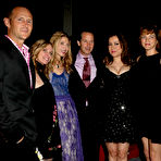 Third pic of Jennifer Tilly posing for paparazzi, shows legs