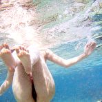 Fourth pic of Nao Yoshizaki - Naughty Asian teen naked on the beach has fun