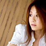 Second pic of Hot Asian doll shows her nice tits