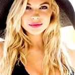 Third pic of Playmate Dani Mathers removes her black wetsuit near the pool