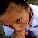 Third pic of Filipina schoolgirl fucked outdoors in open field by tourist
