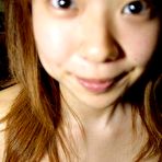 Second pic of Busty Asian babe is posing topless and naked