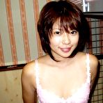 Fourth pic of Busty Asian babe is posing topless and naked