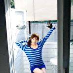 Fourth pic of Shy Asian babe shows her tits to the camera