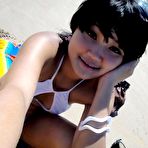Second pic of Cute little Thai amateur Febe poses at the beach and flashes