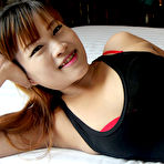 First pic of Big round and brown Thai ass parted and pussy stuffed with white cock