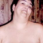 Fourth pic of Amateur BBW wife squishes her big boobs