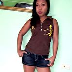 First pic of Thick-assed lil Asian babe gets naked for pics by white guy | Trike Patrol Photo Galleries