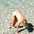 Third pic of Nude Beach. They are naked and happy