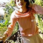 Third pic of Naughty tramp in pink quickly flashes pussy