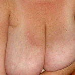 Third pic of Amateur bbw mom plays her 38HH heavy melons and plays cock