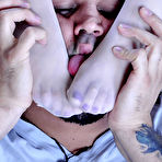 Second pic of Asian beauty teases and milks a stud with her small feet in white FF tights