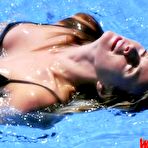 Second pic of Serena Autieri posing sexy and topless for magazines