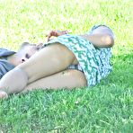 Second pic of Spy upskirt of asian brunette in green dress. Upskirt gallery