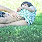 Third pic of Spy upskirt of asian brunette in green dress. Upskirt gallery