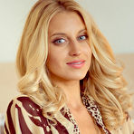 First pic of Blonde hottie Delfina A wearing an animal print chiffon robe and sheer panty that compliments her beautiful tanned body and lusty appeal.