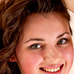 Fourth pic of Sweet-smiling Conchita with her pretty face and voluptuous body posed naked on top of the bed