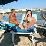 Fourth pic of Naughty young nudists play with each other in sand