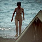 Third pic of Suntanned nudists filmed as they have fun on a beach