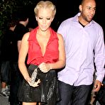 First pic of Kendra Wilkinson shows legs and side of boob