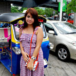 First pic of Cute Thai babe lifts dress to show juicy ass and wet pussy