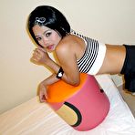 Third pic of Thai cutie shows off her cute tits