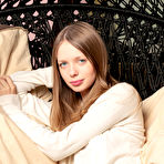 First pic of Marvelous long haired beauty stripping and showing her tantalizing pussy in the cradle.