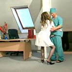 Second pic of Curly mature nurse luring a doctor into frantic fucking right on the table