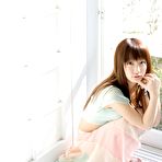 Third pic of Cute innocent teen model shyly smiles