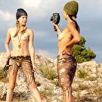 First pic of Two lovely teen girls enjoy helping each other to get nude and sexually posing outdoors.