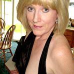 Second pic of WifeBucket - real amateur MILFs and wives! Swingers too!