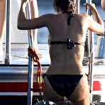 First pic of Salma Hayek in black bikini on a beach