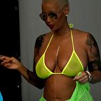 Fourth pic of Amber Rose in yellow see through bikini
