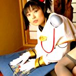 Fourth pic of Pigtailed Asian slut is enjoying showing off